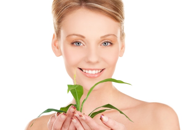 picture of woman with sprout over white