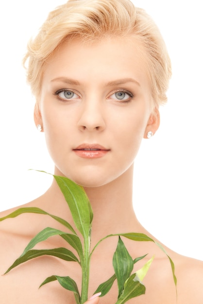 picture of woman with sprout over white