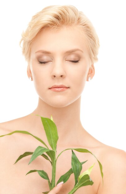 picture of woman with sprout over white