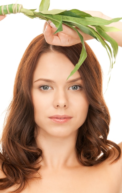 picture of woman with sprout over white