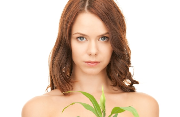 picture of woman with sprout over white