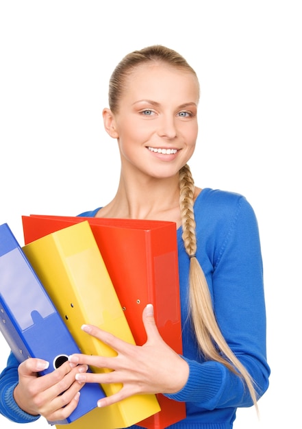 picture of a young attractive businesswoman with folders