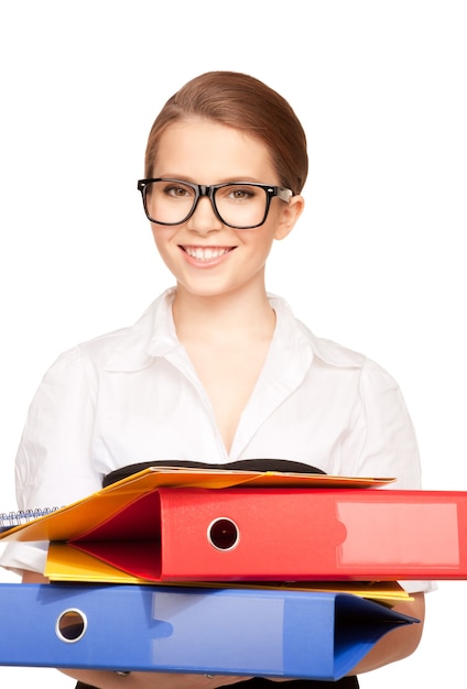 picture of a young attractive businesswoman with folders