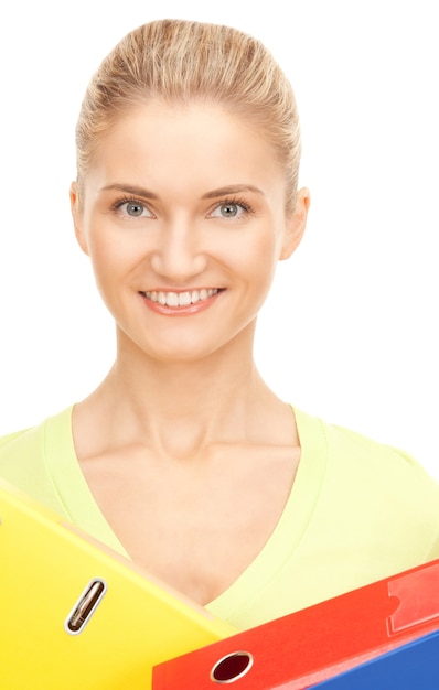 picture of a young attractive businesswoman with folders