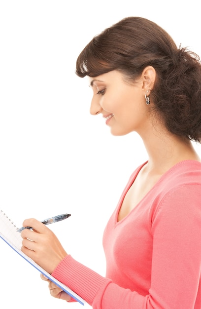 picture of a young attractive businesswoman with notebook