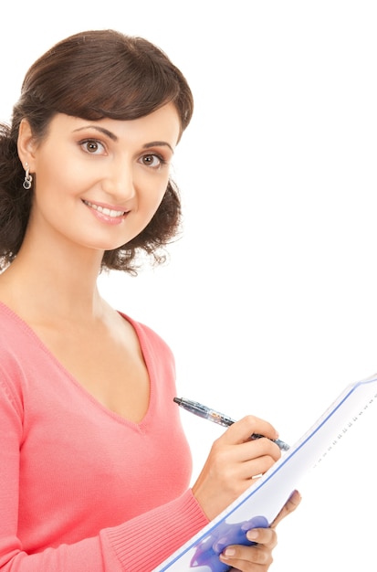 picture of a young attractive businesswoman with notebook