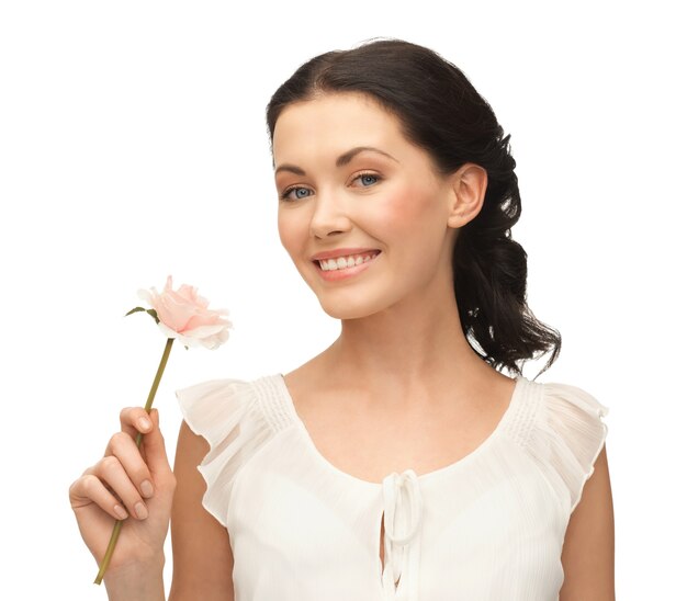 picture of young and beautiful woman with flower