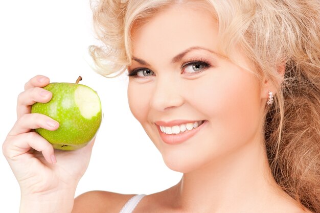 picture of young beautiful woman with green apple