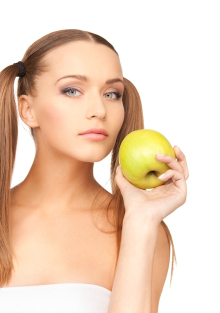 picture of young beautiful woman with green apple