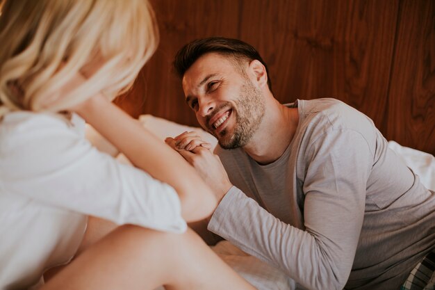 Picture of young loving couple enjoy in bed