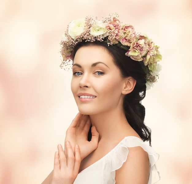 picture of young woman wearing wreath of flowers