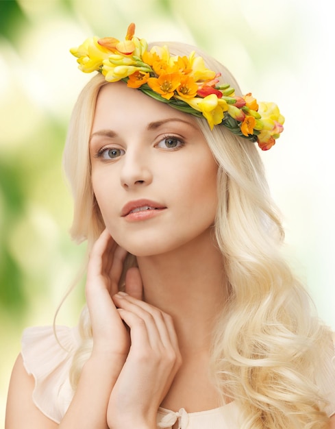 picture of young woman wearing wreath of flowers