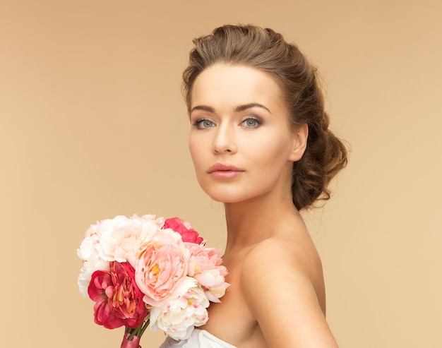 picture of young woman with bouquet of flowers