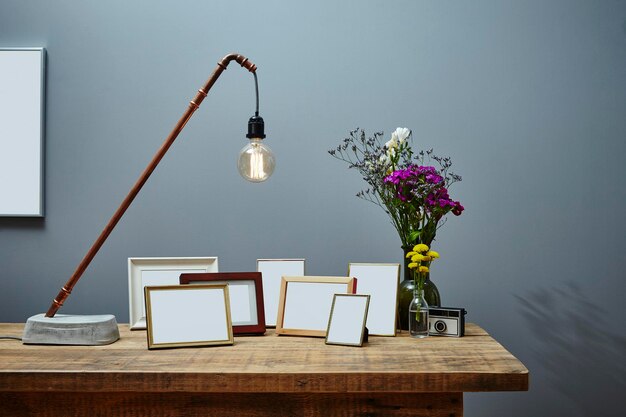 Photo pictures frames against wall on table