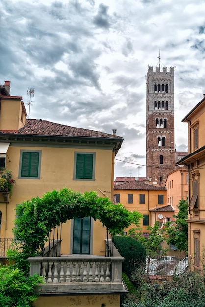 Picturesque flower decorated balcony and tower in Lucca