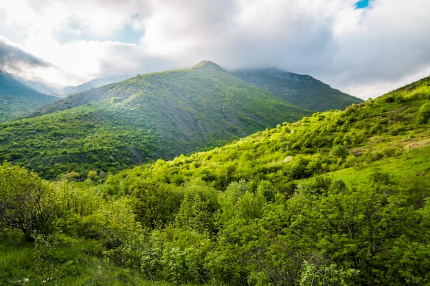 Picturesque landscape of mountains with clouds