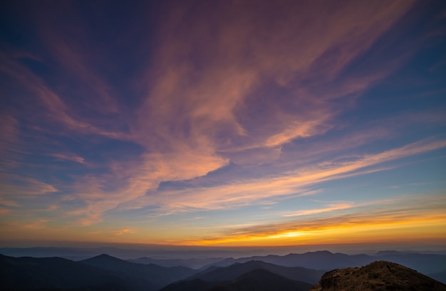 The picturesque sunset above mountains