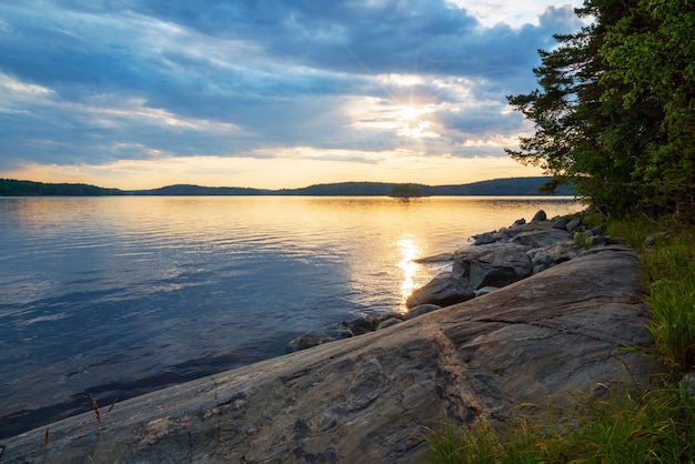 Picturesque sunset on the shore of the island