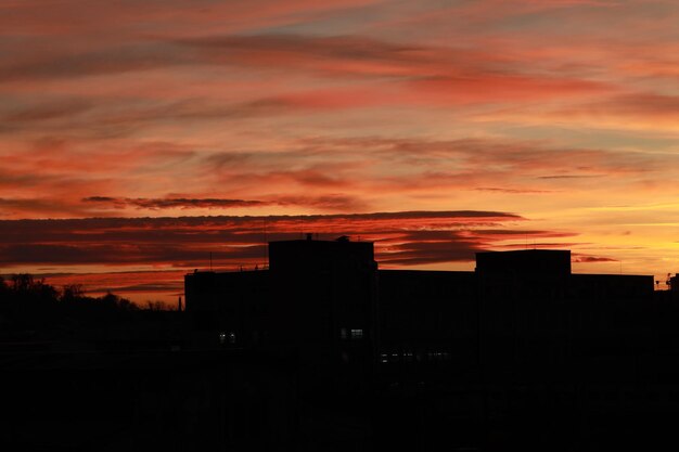 Picturesque view of bright dawn in city