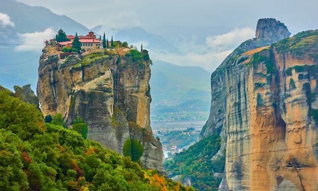 Picturesque view of The Holy Trinity monastery on the top of the rock in Meteora, Greece