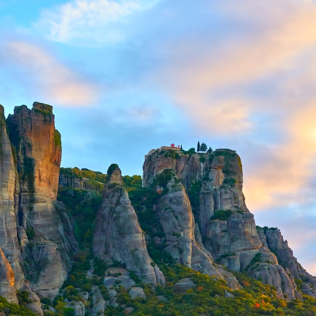 Picturesque view of rocks and St. Stephen monastery on the top at sunrise, Meteora, Greece