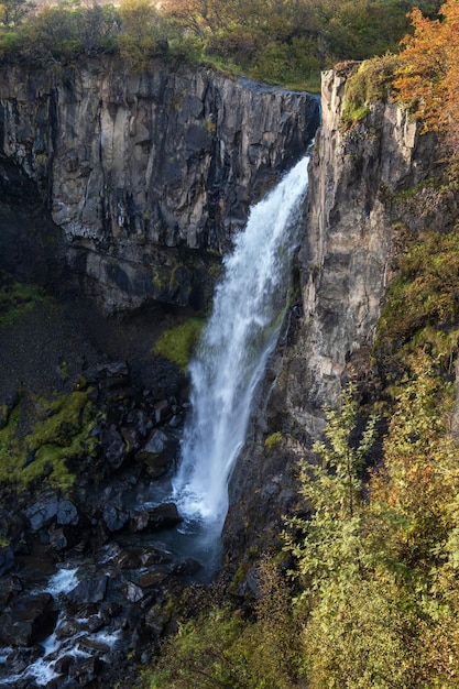 Picturesque waterfall Hundafoss autumn view Skaftafell National Park Iceland