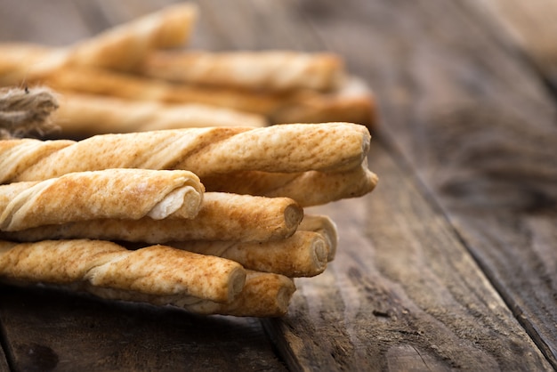 pie or bread Sticks with rope sack on wood