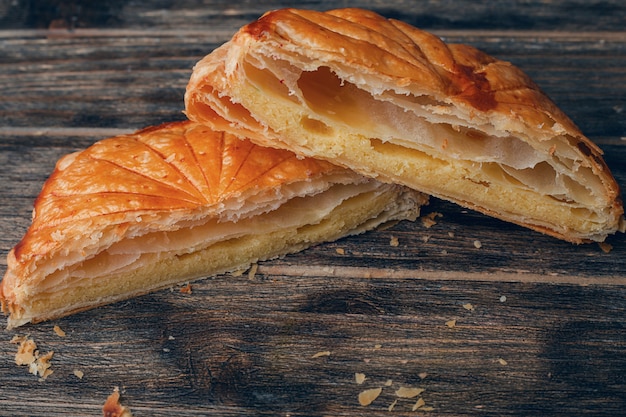 Pie cake. Traditional baked pastry food on rustic wooden table wall