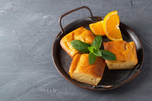 Pie mint and orange on a metal tray