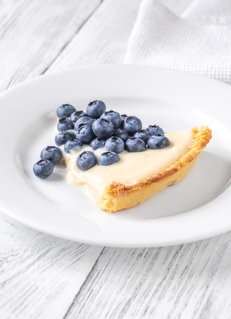 Pie with fresh blueberries and custard filling