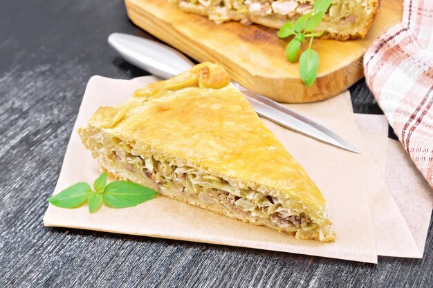 Photo pie with meat and cabbage on board