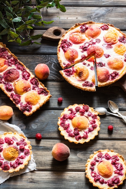 pie with peach and raspberry, french galette. Peach tart. Raspberry tart. Tartalette with 