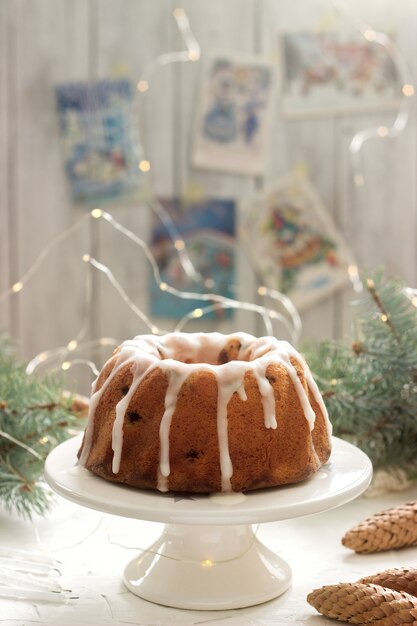 Pie with raisins and icing from powdered sugar 