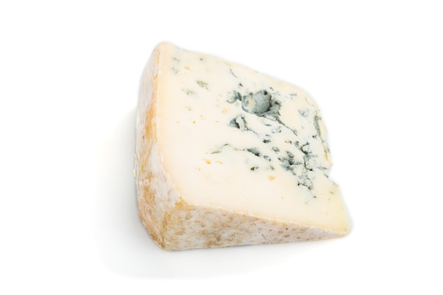 Piece of blue cheese on white.