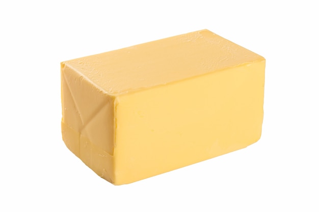 A piece of butter on a white background