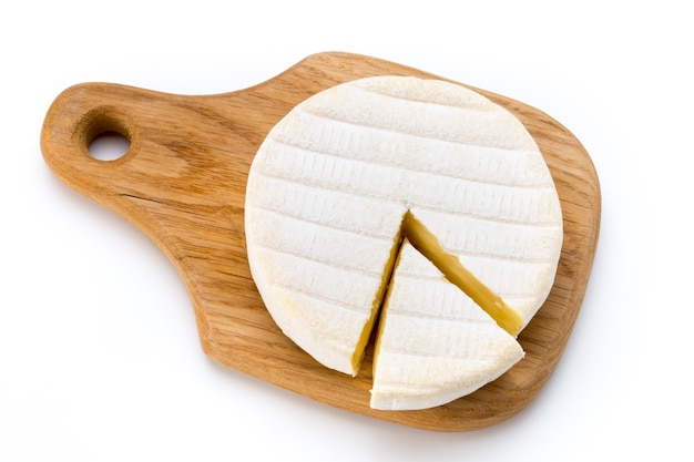 Photo piece of camembert cheese isolated on white background.