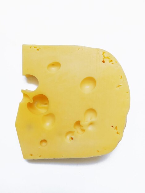 Photo piece of cheese on a white background