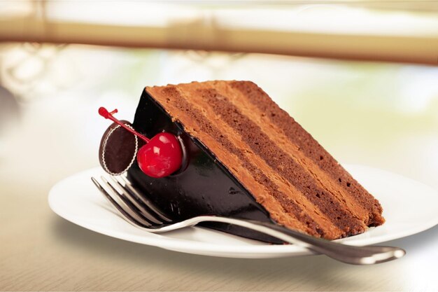 Photo piece of chocolate cake, close-up view