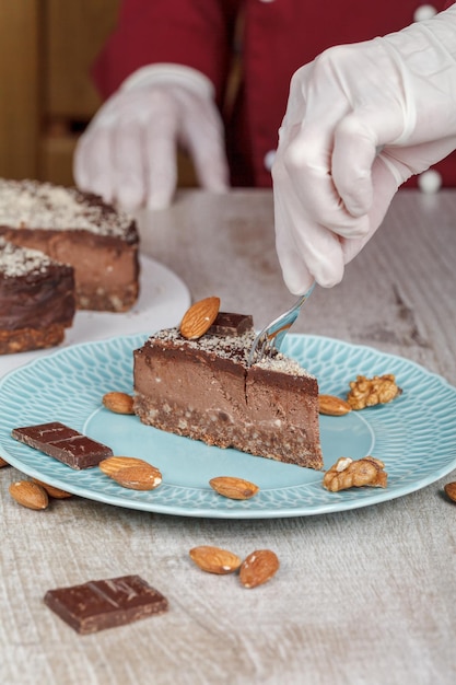 A piece of chocolate pie on a blue plate