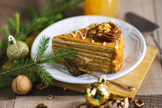 A piece of Christmas honey cake on the table