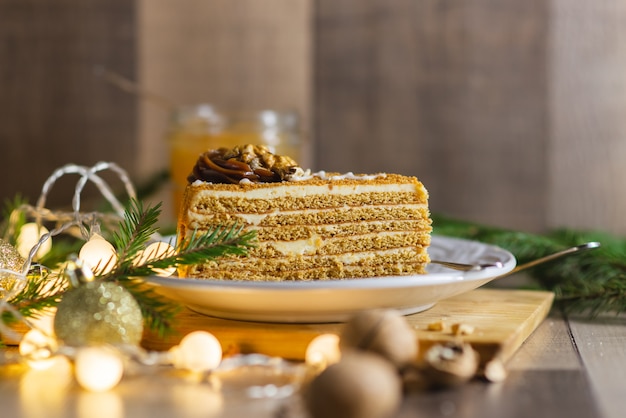 A piece of Christmas honey cake on the table