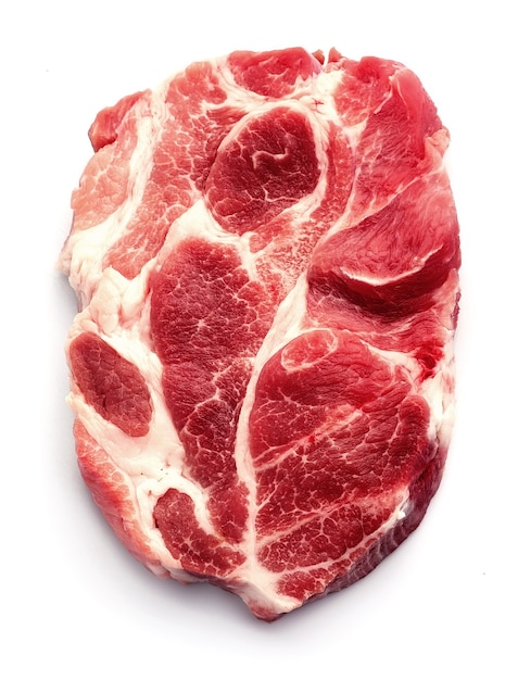 Piece of crude meat isolated close up