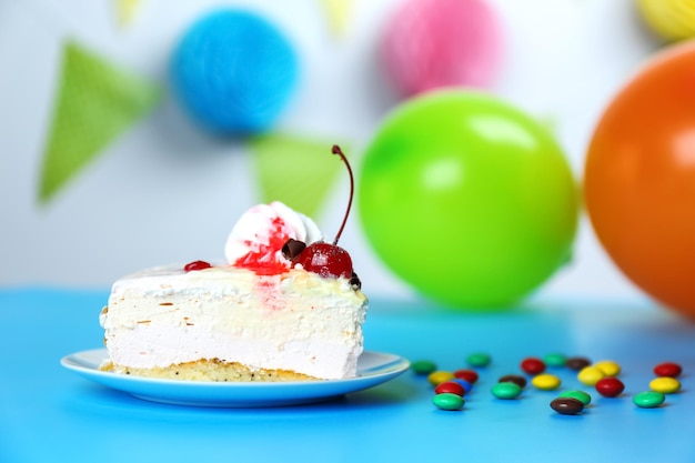 Piece of delicious cheesecake on festive background