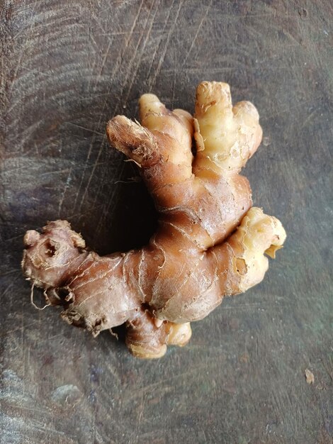 a piece of ginger on wood