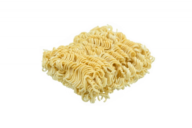 Piece of instant noodles on paper isolated white background