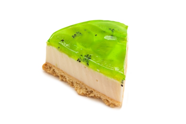 Piece of kiwi cheesecake isolated  