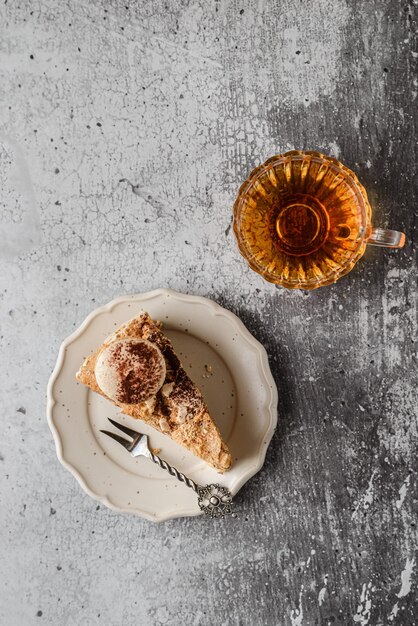 a piece of meringue cake and nut cream