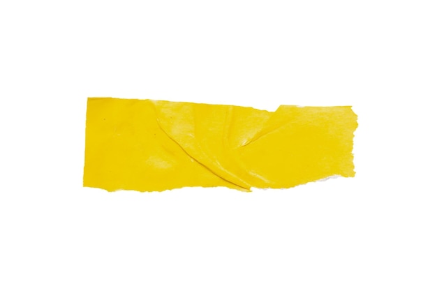 Фото Кусочек желтой бумаги слезы изолированы на белом фоне