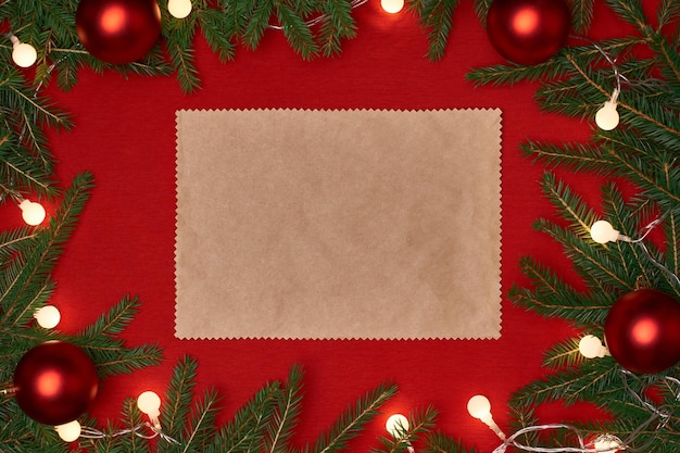 Piece of paper on a red Christmas background. photo with a place for text.