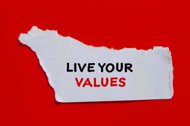 a piece of paper that says live your values on it